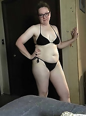 Old lady is getting undressed